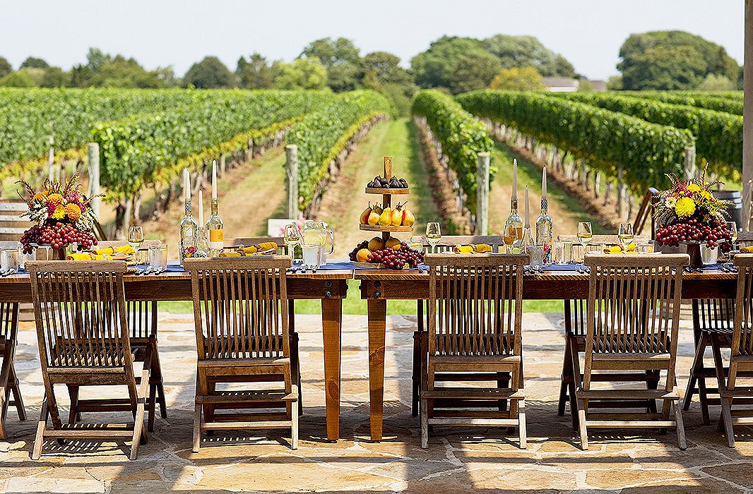 With tables set up on the terrace, guests enjoyed shade from the wooden pergola while taking in spectacular views of the acres of vines.
