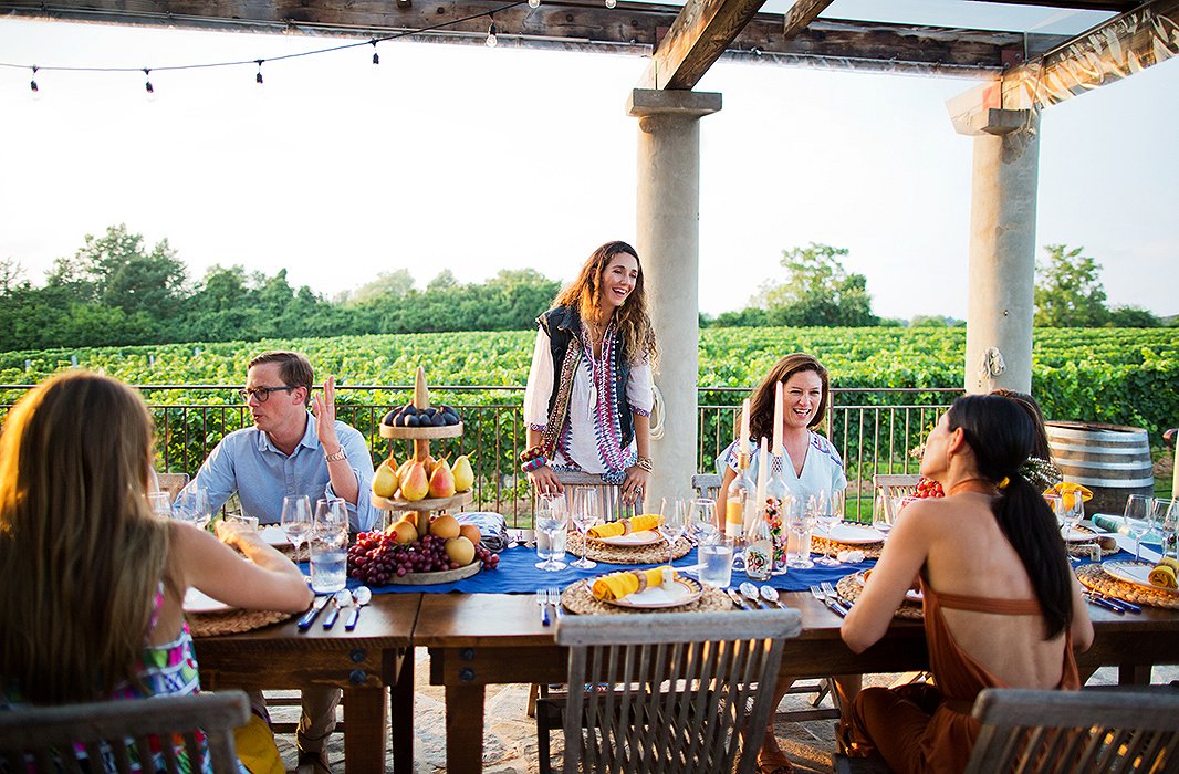 Two farm tables pushed together created one long communal gathering spot—and ensured that everyone got in on the conversation.
