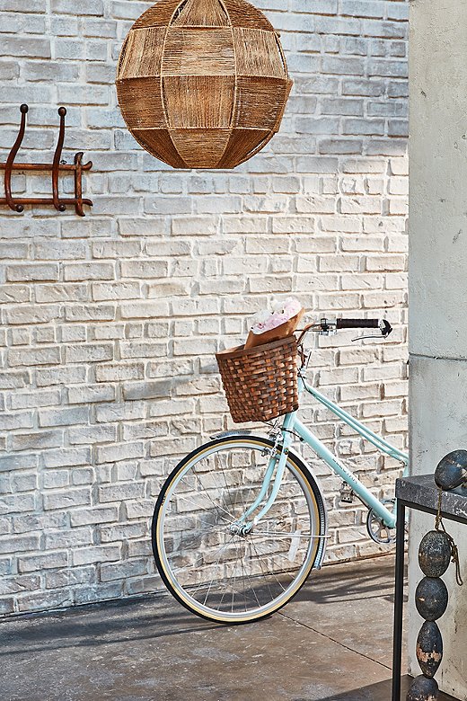 The jute construction of this light fixture brings time-honored texture to the space, but the geometric shape is thoroughly modern.
