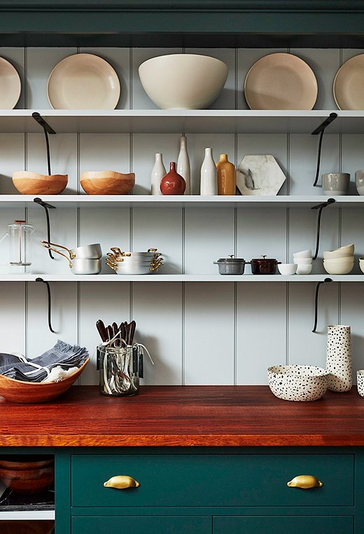 Mixing open and closed storage in a kitchen allows you to stow clutter out of sight while keeping favorite pieces on display. The shelves in our Soho shop hold a rotating collection of cookware and serving pieces by some of our favorite brands.
