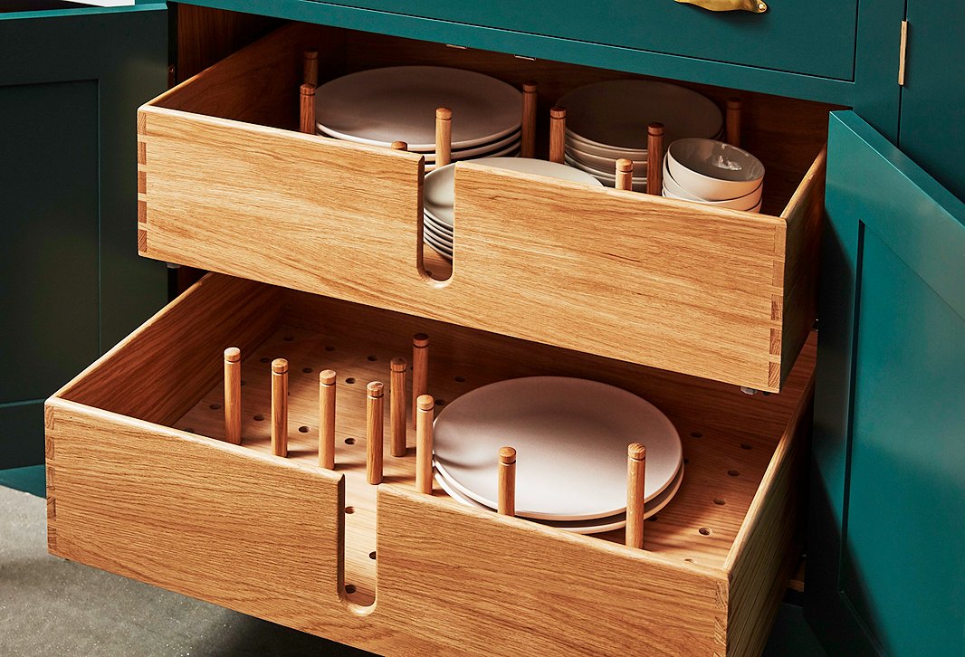 Plate drawers provide convenient access to items used every day—and make it easy for kids to help with setting the table. Movable pegs let you customize the configuration to your needs.
