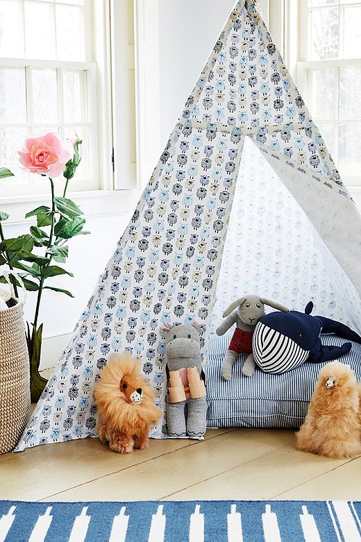Fitted with an oversize pillow, a tepee becomes the ultimate playtime hideaway.
 
 
