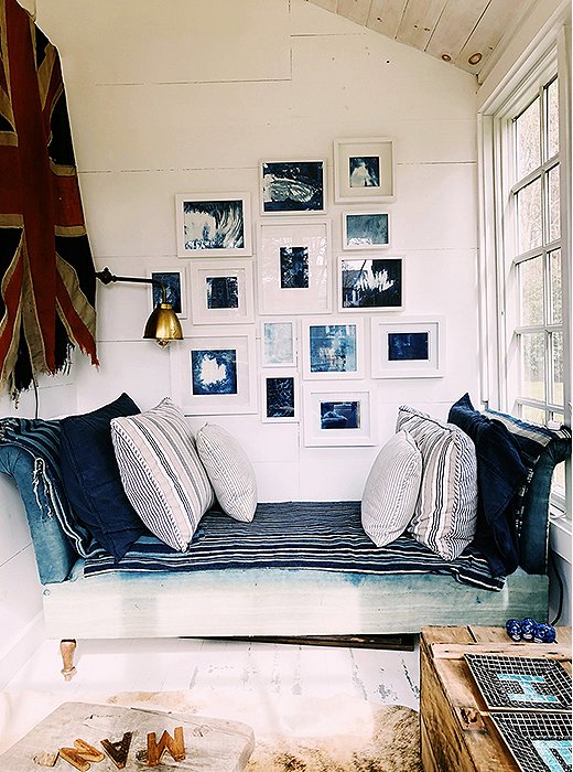 This antique French daybed is one of Dean’s favorite pieces. “I remember finding it at small shop in Riverhead—it had been sitting in a barn. The fabric was original French ticking that I ended up stripping off and dyeing in indigo. It sits in a nook in the sunroom and is the best spot for a summer afternoon nap.”
