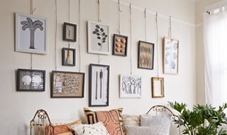 hanging portraits on wall