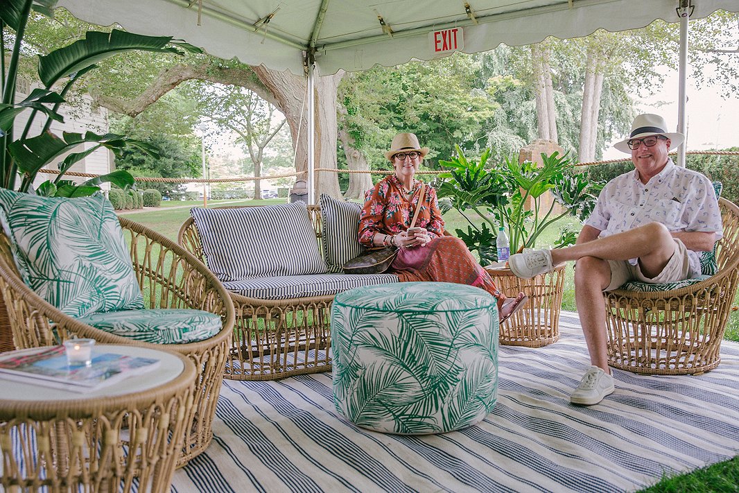 Guests enjoy a quiet moment on One Kings Lane’s exclusive Palma outdoor furnishings at the Southampton shop.
