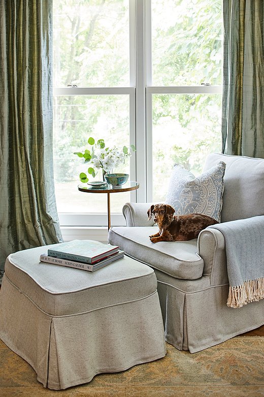 Lola the dachshund makes herself comfortable in the bedroom reading nook. “She packs a lot of personality into a little body!”
