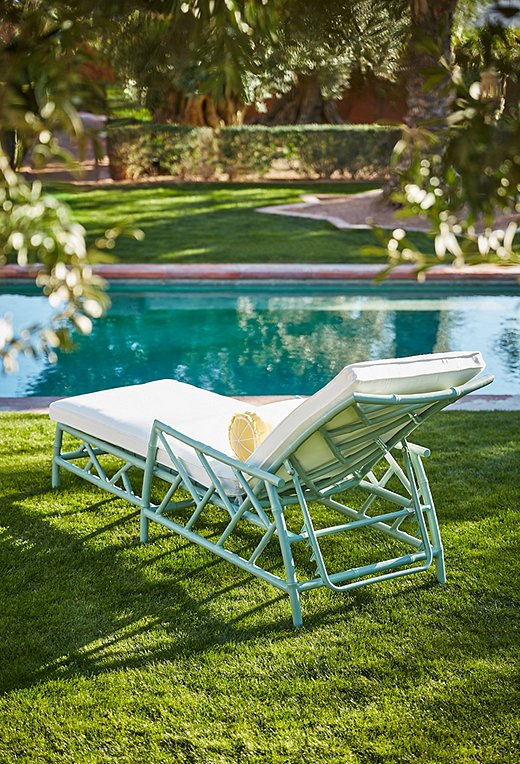 The Kit Chaise in celadon makes a perfectly stylish (and perfectly comfy) poolside perch.
