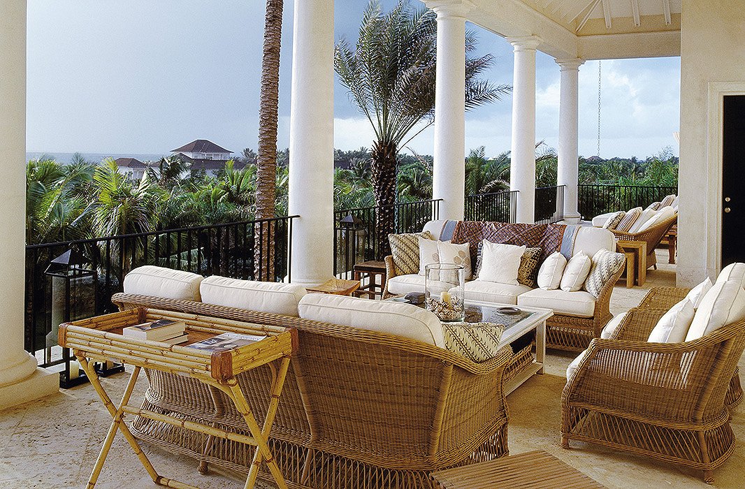 One of Bunny’s favorite reading spots is an inviting cove on the second-floor balcony, which looks out across fanning treetops to the sparkling waters. “The eye is constantly rewarded with framed views and the promise of the discovery of something new and wonderful at every turn,” she notes.
