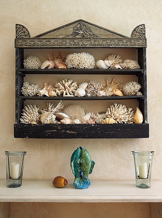 “Some of nature’s offerings can add the perfect touch to a home and give it a ‘sense of place,'” Bunny writes. Here, corals and shells from the shores bring in the breezy seaside spirit of Punta Cana.
