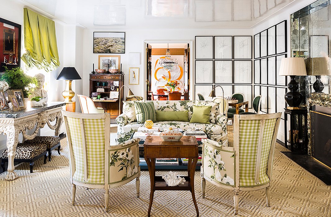 A swatch of Bob Collins chintz lay dormant in Kate’s “fantasy file” for seven years later, until it served as the driving force behind the design for her living room, taking center stage on a slipcovered sofa and two 19th-century Directoire-style bergères. “I think it comes from having grown up in Los Angeles, where my mother has a wonderful green garden with a kind of lush Southern feel to it,” says Kate of her affinity for the print. For an almost identical rug, see the Neptune. 
