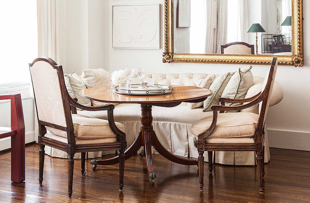 Loose seat cushions soften the angular lines of these Louis XVI armchairs.
