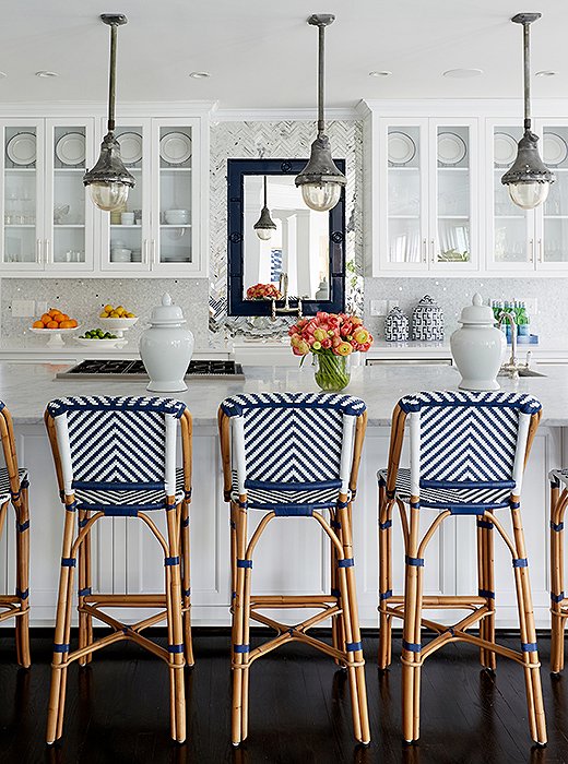 In the newly decorated kitchen, the only pieces that remained from the original design are the trio of antiqued steel pendants, which Cassie picked up on a drive through Franklin, TN.
