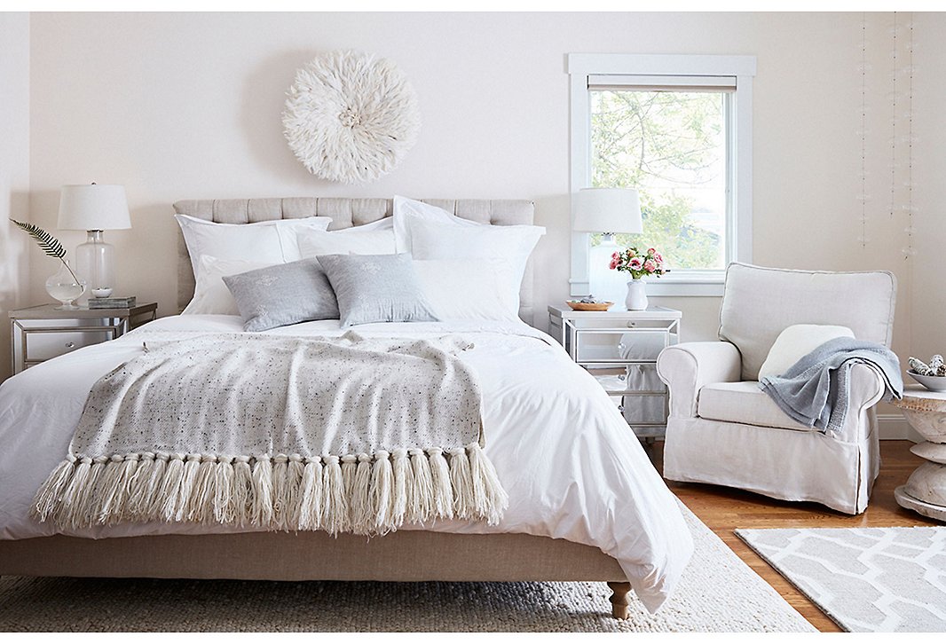 Sefte creates pillows, sheets, throws, and other casually elegant pieces perfect for cozying up. Photo by Seth Smoot.
