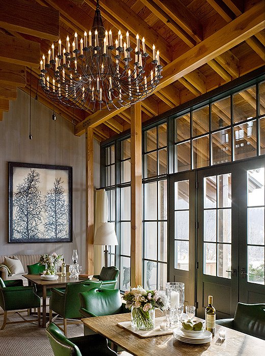 A wall of windows in the Farmhouse shows off the pastoral landscape to perfection.
