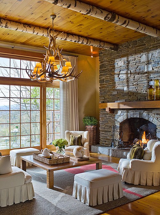 Soaring ceilings and a stone fireplace set the scene for post-hike relaxation in the Chalet.
