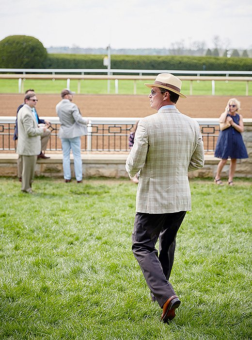 Jon strolls toward the track.
