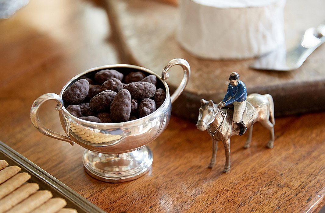 A trophy is repurposed into the perfect vessel for coated nuts.
