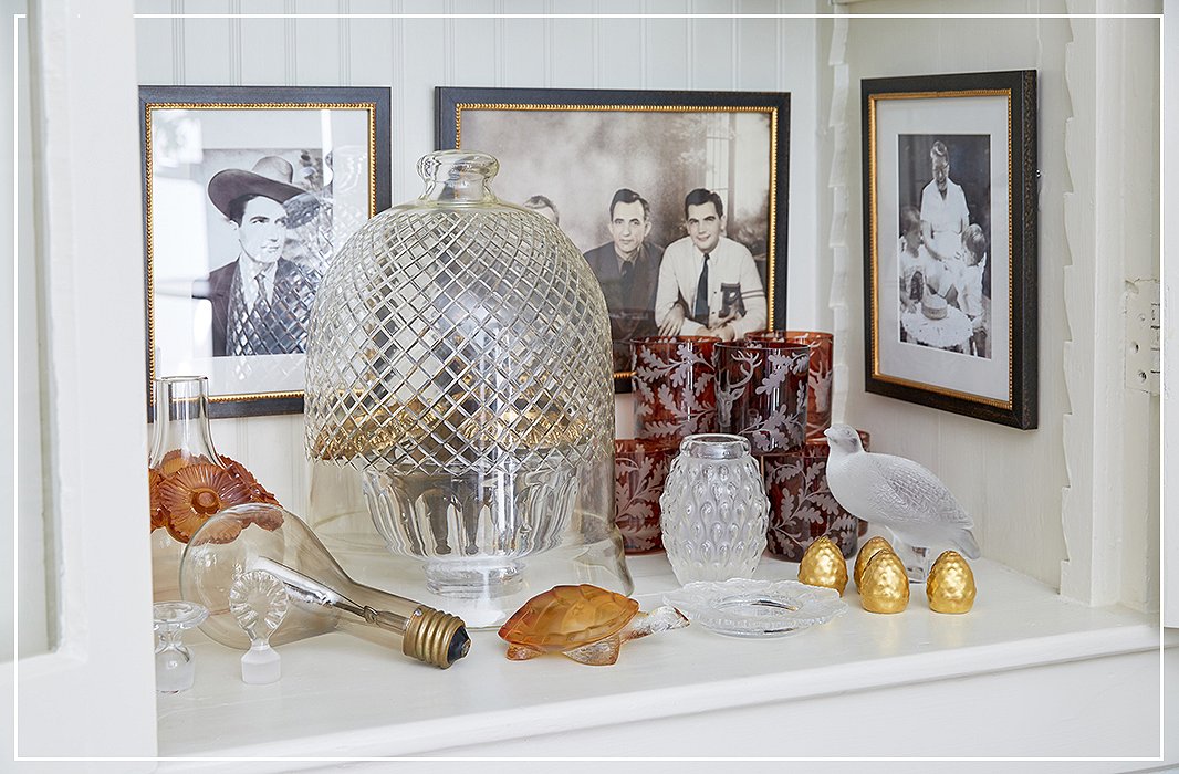 Possessions artfully arranged and thoughtfully curated transform a shelf into a shrine. The man in the hat? Jon’s father.
