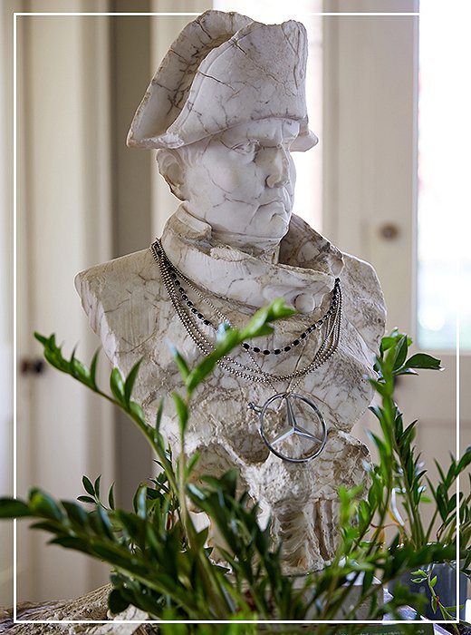 Aristocratic funk: A bust of Napoleon greets visitors atop a pedestal table in the foyer of Jon’s home.
