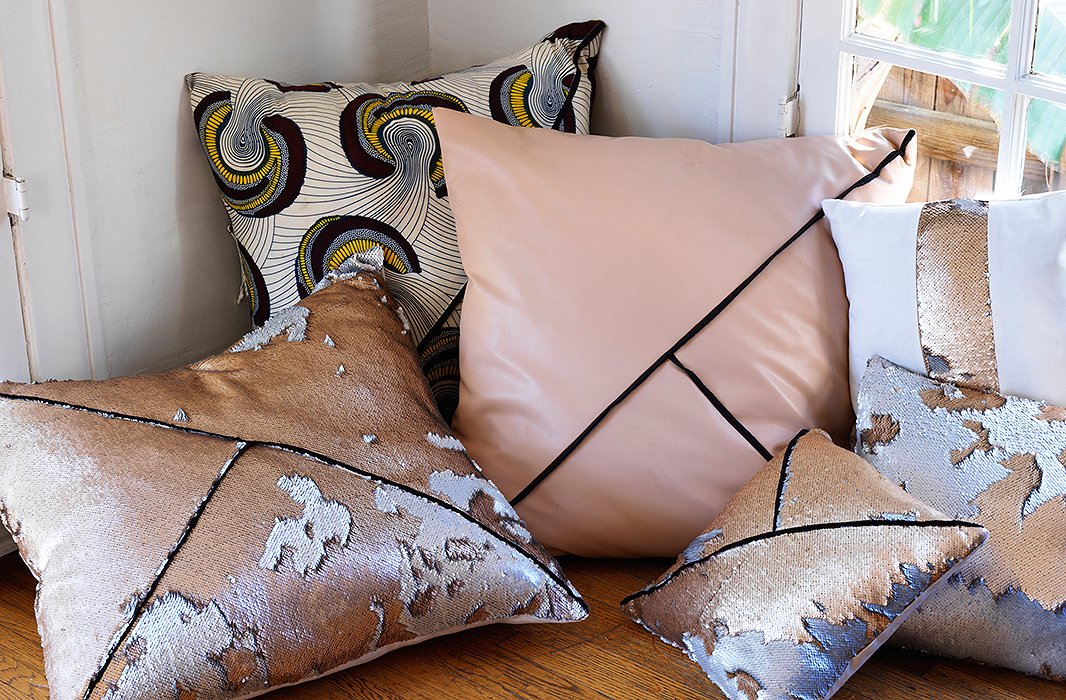Heidi’s signature collection of pillows, cut from the same fabrics as her dresses and skirts, run the gamut from brilliant ikats to nude leathers to sequins.
