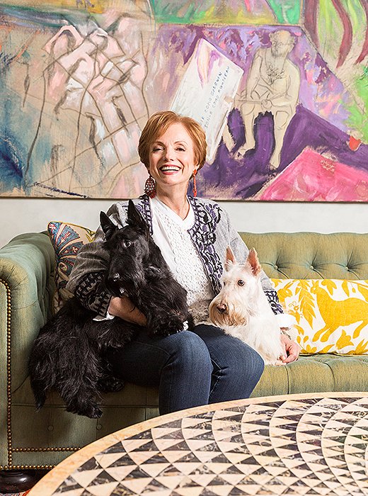 Roberta cozies up with Alfa and Romeo in front of one of her most treasured possessions, a large-scale painting that she and her husband unearthed in Buenos Aires. It’s now a striking focal point in the couple’s living room. “When I walked into the apartment I said, ‘That’s where the painting’s going.’ It found its place immediately.”
