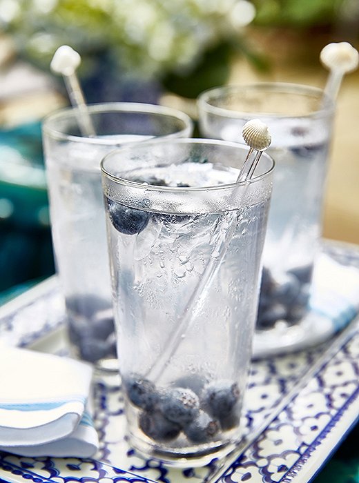 As a refreshing summer sipper, Guérard served vodka sodas with a splash of grapefruit and fresh blueberries. “I call it my skinny drink,” she jokes.
