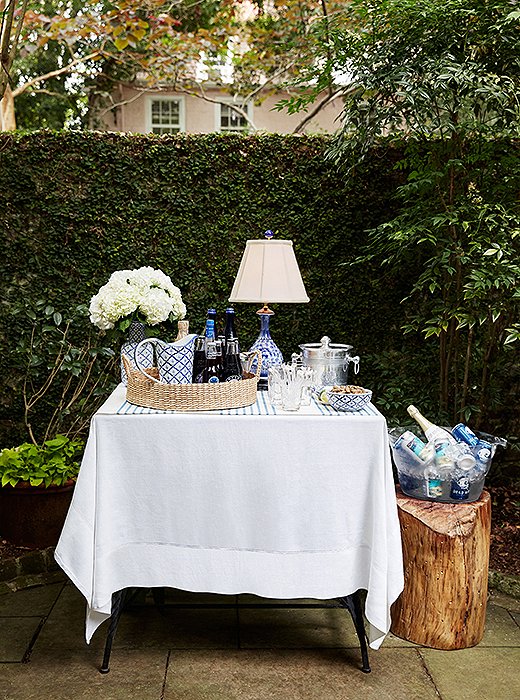 The designer set up a self-serve bar in garden where guests could help themselves to drinks throughout the night. “I always think that you should have everything available to drink at any kind of party—meaning liquor, beer, wine, champagne—because you never know what every single person drinks or what they’re in the mood for.”

