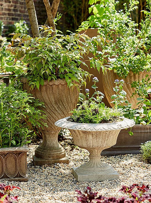 Part of the fun of making an indoor garden lies in breaking the rules on which vessels might typically go outside or in. What’s more, delicate pieces like an antique plant stand can be easier to preserve indoors. Wouldn’t one of these weathered urns look lovely in a foyer?
