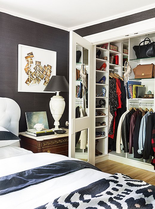 “I added a really big master closet by stealing the closet from a room next to it,” she says. “I had California Closets come and pimp it out for me.”
