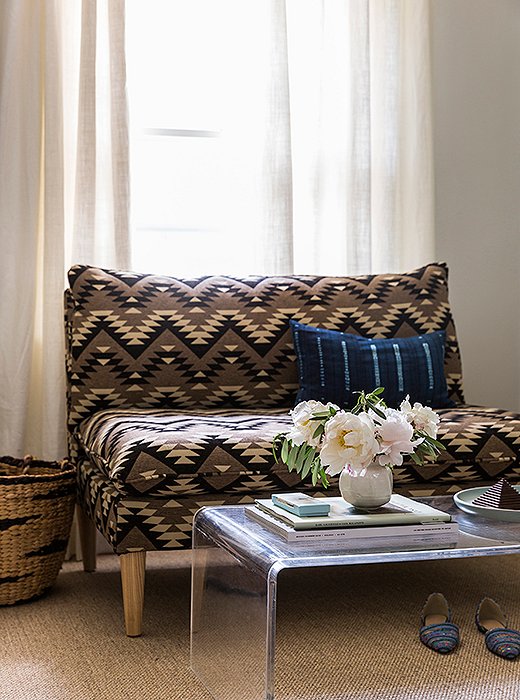 When choosing fabrics for her line, which includes this tribal-print settee, “I thought about the classic collections that companies like Ralph Lauren have been reintroducing, with Navajo-inspired textiles,” Michelle says. “They’re always going to have a place in the home.”

