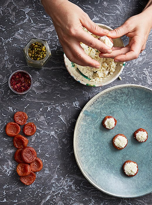 Dried Lebanese apricots are stuffed with queso fresca and pistachios.
