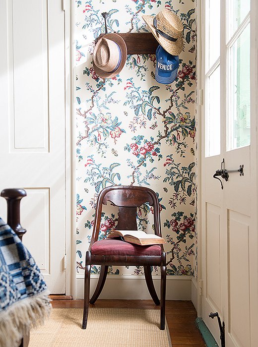 The Butterfly Chintz wallpaper produced by Adelphi Paper Hangings, a company specializing in historically accurate custom papers, is “a hand-blocked copy of an antique French paper in the collection at Colonial Williamsburg,” says Thomas. He used it for a home he restored in Virginia before covering his own bedroom with it. “I remember saying to my colleague, ‘Can I get away with this? Is this oppressive?’ It’s a good example of taking a risk.”
