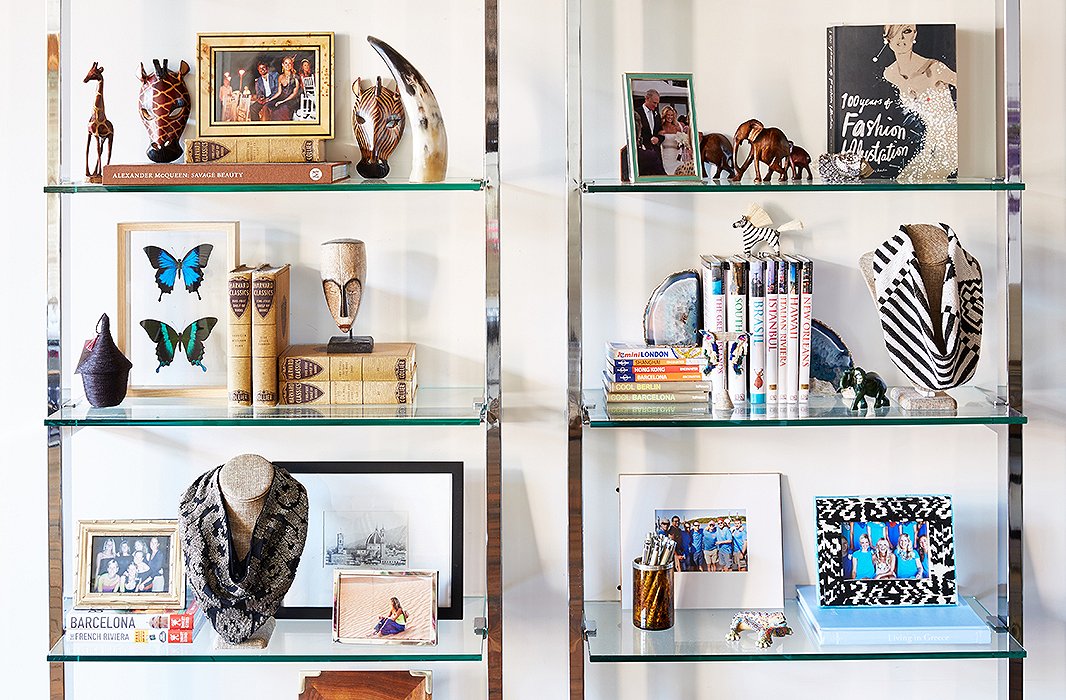 Mignonne’s bookshelves showcase relics and reading from her travels. “I travel a lot and love going to the local markets for inspiration. We source materials primarily in France, Italy, and India.” Her pieces are “hand-beaded in India by the same craftsmen who work with Oscar de la Renta, Dries van Noten, Balmain, and Carolina Herrera, to name a few.”
