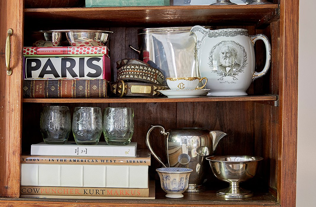 The china cabinet “was a great place to just pile all of my cherished pieces and still see what I have to play with,” Jennifer says. “I love all of my antique china so much, and I use it for all different occasions.”
