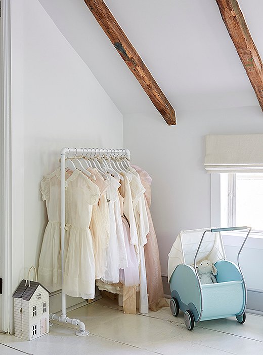 Tallulah’s collection of pastel dresses is picture-perfect for the soft palette of her bedroom.
