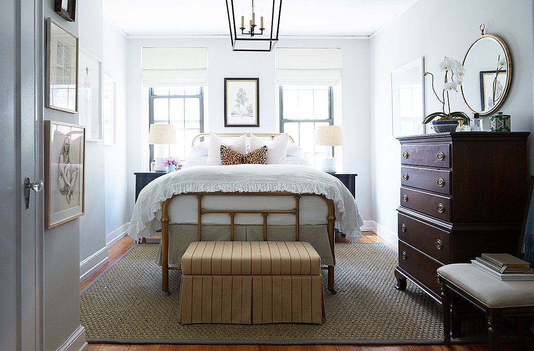 Reconfiguring the bedroom layout gave the space depth and a strong style statement. “Before, you couldn’t see the amazing bed through the clutter. I wanted to give Cole’s great pieces a stage to shine,” says Alex, who dressed the room in neutral shades: beige, white, and black.
