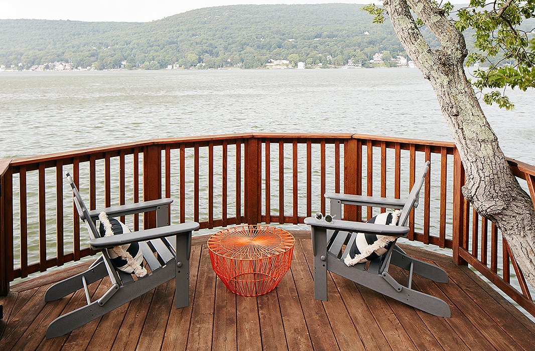 The Adirondack chairs on the middle deck are the perfect spot to take in the lake views.
