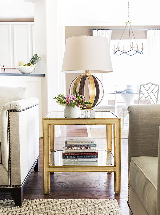 The gilded side table and lamp add some glamour to the tonal space. Paloma loves using fresh-cut flowers of all kinds. “Peonies, hydrangeas, and roses are my favorites. But I also love potted orchids, which last longer and look beautiful.”
