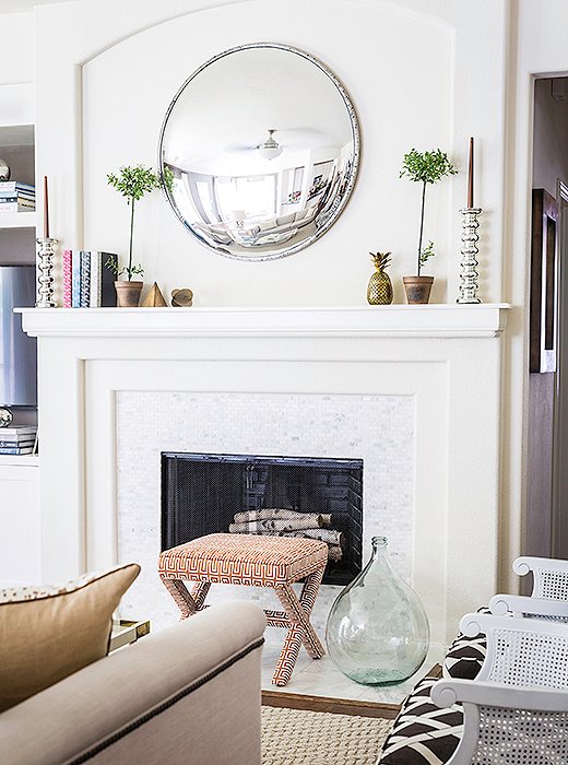 Open to the kitchen, the second living room is relaxed and airy while retaining Paloma’s signature polish. The sofa is custom. “I wanted something with clean lines that still felt classic,” she says. The rug’s as sturdy as it is stunning. “We spend a lot of time in this room with our dog.”
