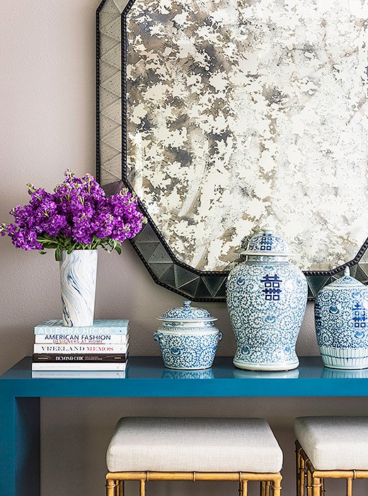 An unexpected major style moment in the master bedroom comes courtesy of a Karl Springer Parsons table. “It’s from the early ’70s,” says Paloma. Originally lime green, the console has had many color incarnations. “I chose this peacock blue because I was really inspired by it at the time. And I still love it.”
