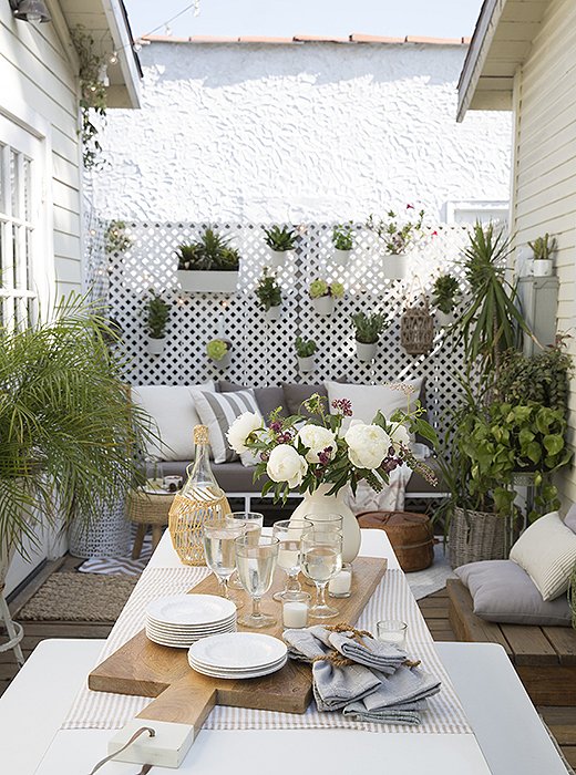 “Wooden bread and cheese boards are both practical and beautiful, so I commonly use those when entertaining outdoors,” Whitney says.
