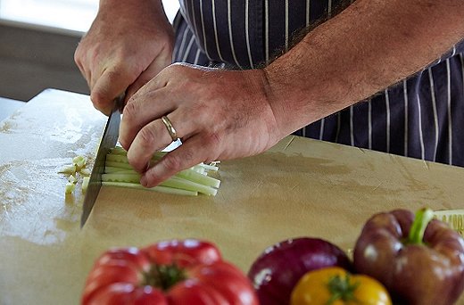 Slice the cucumbers lengthwise into quarter-inch strips, then turn and dice into quarter-inch cubes.
