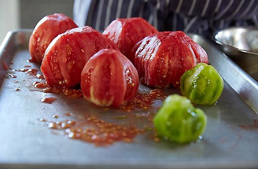 Core the tomatoes (again, cores go into the purée), then put them in boiling water for 10 seconds. Take them out, let them cool, and gently peel by hand.

