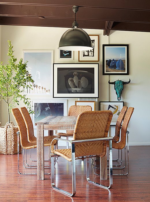 The lack of a rug plays up the wicker-and-chrome dining chairs, which Alex calls “such standouts.”
