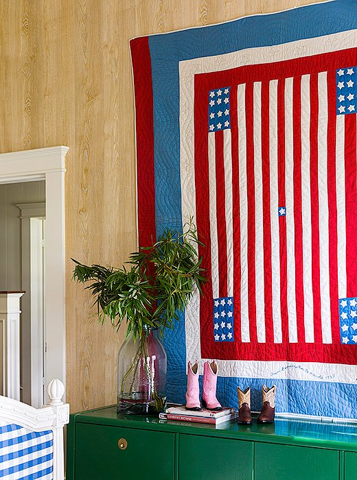 A vintage quilt adds a touch of Americana and, as chance would have it, is embroidered with “Harold,” Bailey’s son’s name. “It’s not really a family heirloom, but it feels like it is.”
