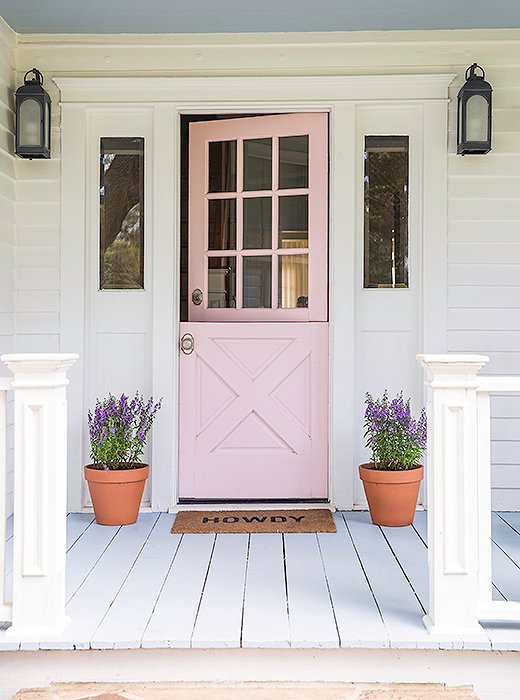Bailey and Pete didn’t need to do much to the farmhouse’s exterior to make it picture-perfect. “We added scalloped shingles to enhance its existing Victorian charm and gave it a fresh coat of paint and a cute pink Dutch door,” Bailey says. “She already had so much going for her, our touches were just a bonus.”
