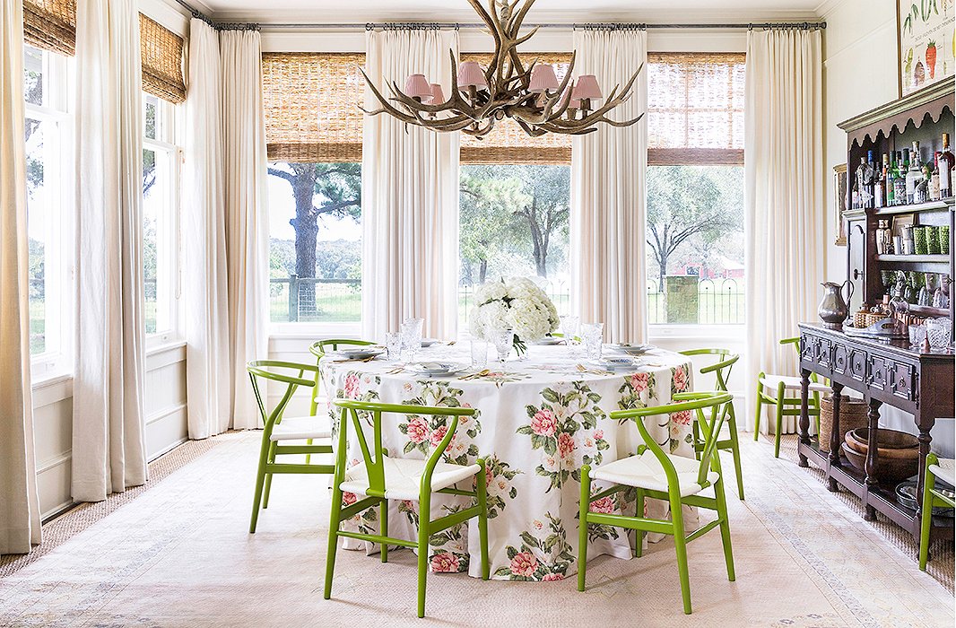 The round table is perfect for a crowd but doesn’t feel overwhelming when it’s just the family of four. “When you have a long skinny table, it just feels empty, whereas with a round table you can just keep squeezing people as more come,” Bailey notes. It took her a while to come around to the antler chandelier, which was left by the previous owners. “Once I got everything in there together, it just felt fun to me, so I left it.”
