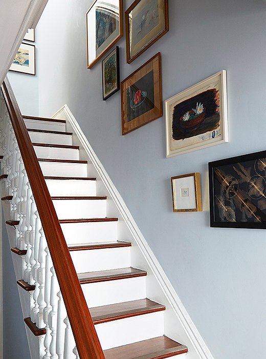 Inherited watercolors stay safe, secure, and better displayed along the staircase. The cloudlike form is rounded out by a celestial black-and-white work by my friend Field Kallop.
