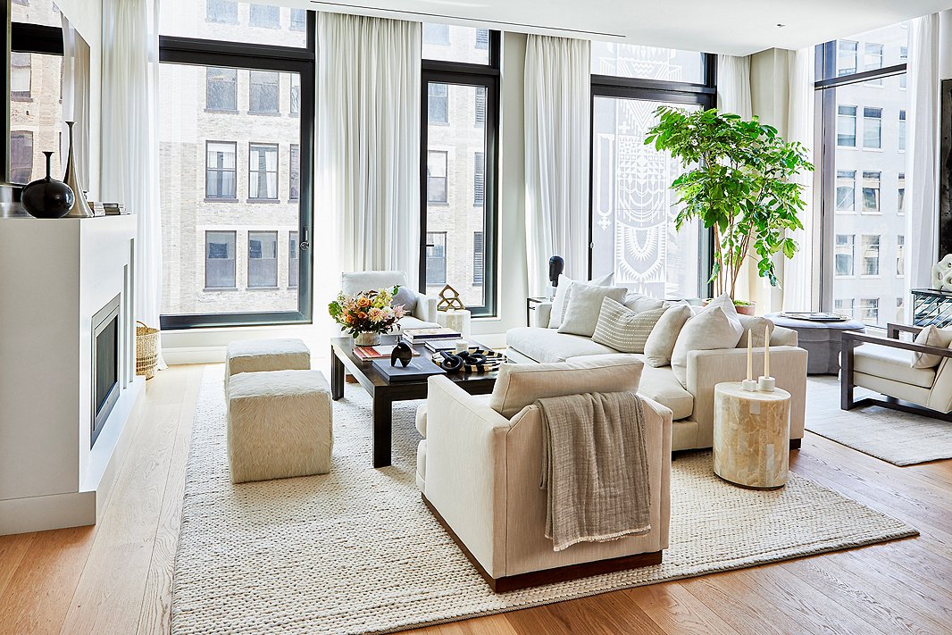 The living room of this Manhattan apartment proves that sophisticated and family-friendly need not be mutually exclusive. Stain-resistant upholstery on the Hudson Sofa and the Shaw Swivel Club Chairs helps. We also love that the curves of the Greta Spot Side Tables ensure the space doesn’t feel boxy. Room by One Kings Lane Interior Design; photo by Tony Vu. See the rest of the apartment here.
