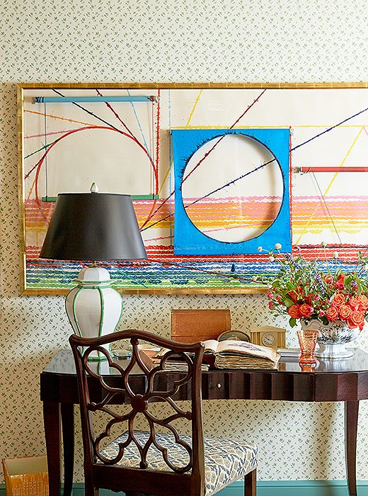 A James Rosenquist painting adds a contemporary contrast to the guest room. “If you have a piece that you really love, regardless of the style, it will work,” says John.
